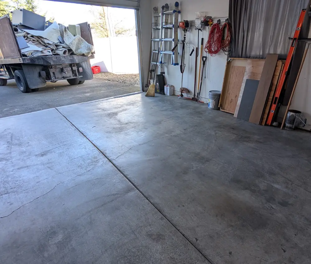 Empty Garage after the professionals at patriot hauling and junk removal's garage cleanout service